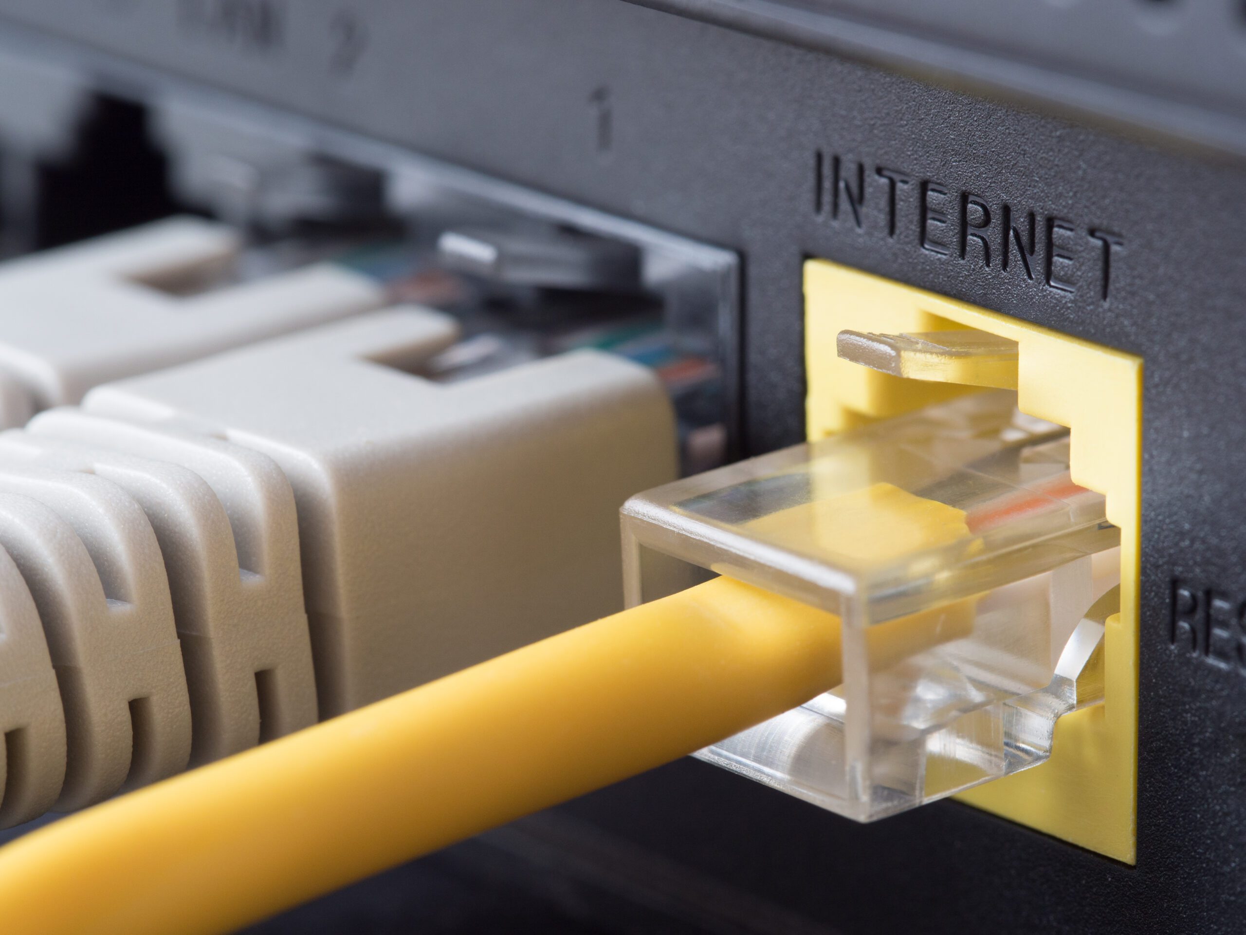 image of internet cable plugged into router